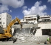 The occupation forces a family in Jerusalem to demolish its house
