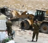 The occupation municipality starts demolishing two houses in the Ain al-Loza neighborhood in Silwan