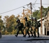 The occupation arrests 18 citizens