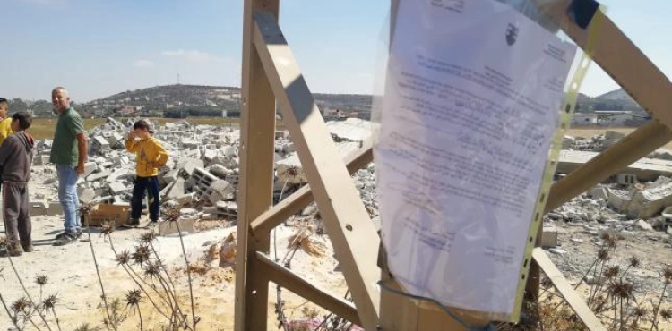 The occupation demolishes a building under construction south of Jenin