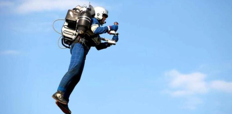 A man is flying in the air using a jetpack in Los Angeles