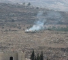 Settlers cut down old olive trees in Jalud