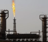 A fire in an oil refinery, north of Baghdad, after a missile fell