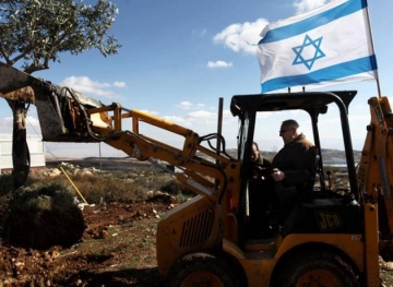 The occupation begins a massive settlement project that isolates four villages from Bethlehem.