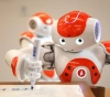 Realization of a new artificial intelligence technology that allows robots to write in Braille for the blind