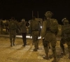 The occupation arrests 12 citizens