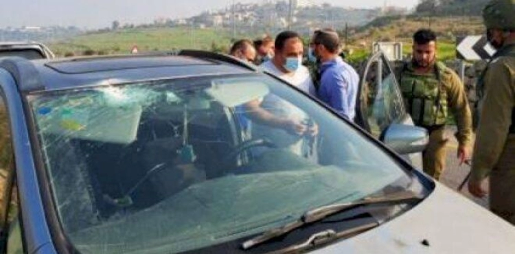 Settlers wear tires and break windows, south of Bethlehem