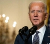 Biden signs an executive order that facilitates the voting process on the anniversary of the crackdown on a civil rights march