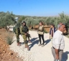 The occupation prevents the people of Qarot from splitting an agricultural road