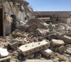 The occupation forces a Jerusalemite to demolish his house in Jabal Al Mukaber