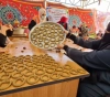 A â€‹â€‹social initiative to make &quot;Eid cakes&quot; and distribute it to poor families in Gaza