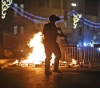 The occupation brutally suppresses the sit-in people in Sheikh Jarrah and arrests 5 citizens