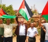 The start of a march to raise the Palestinian flags in Qalqilya