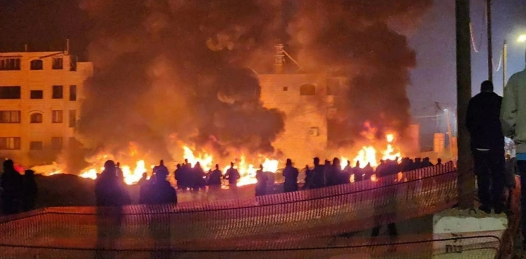 A martyr, injuries, and houses set on fire, following the settlers&acute; attack on southern Nablus