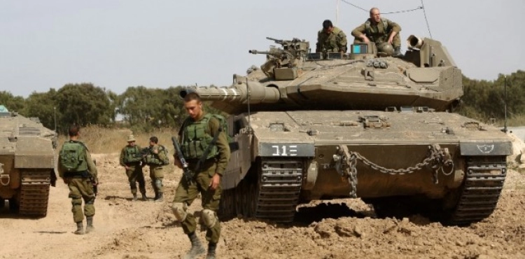Ha&acute;aretz: Israel is very cautious about going to a ground war in Gaza