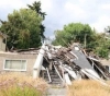 A burnt house is offered for sale for $3 million.