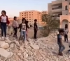 Seven brothers of the Al-Obaidi family of Jerusalem forcibly demolish their homes and erect a tent over the rubble