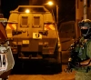 The occupation besieges the Abu Mishaal Monastery, injuring two young men with its fire and harassing the villagers