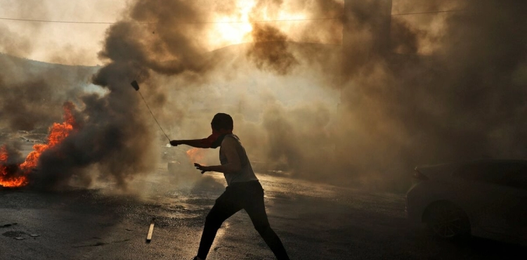 The occupation ran over a young man in Beit Ummar and clashes erupted