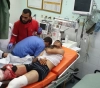 The occupation kills a young man and kidnap his body and injures 4 of them in serious condition south of Gaza Strip