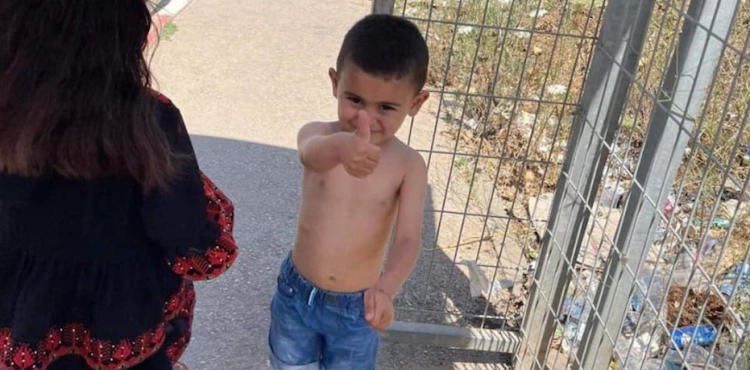 The occupation forces a child to take off his clothes in Jenin