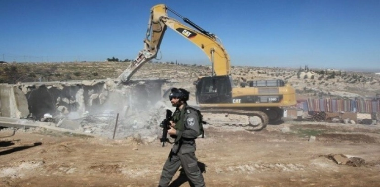The occupation demolishes a house in the occupied interior