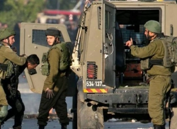 The occupation arrests a boy south of Nablus