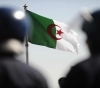 An Algerian court sentences 49 people to death on charges of burning a citizen and abusing his corpse in the Kabylie region