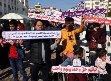 Dozens of people with special needs demonstrate in Gaza to demand their rights