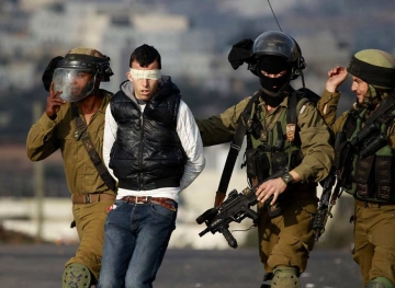 The occupation arrests 4 boys from al-Mughayyir in Ramallah