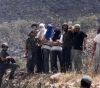 Settlers assaulted three brothers and destroyed their vehicle, east of Ramallah