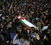 The masses of our people in Qalqilya bid farewell to the body of the martyr Abd al-Karim al-Sheikh