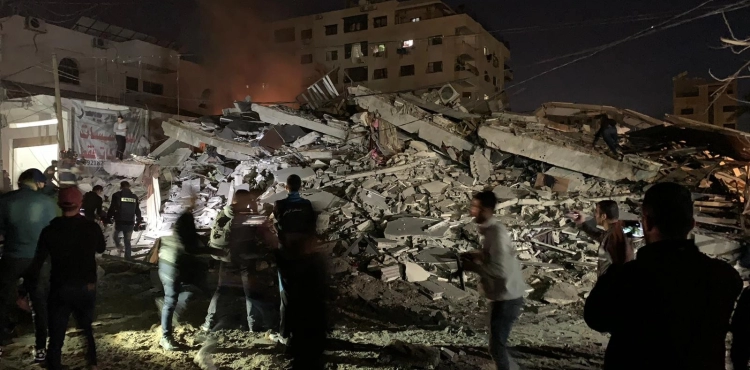 Israeli planes destroy a residential building west of Gaza now