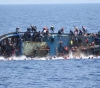 12 immigrants were killed when their boat sank off the coast of Greece